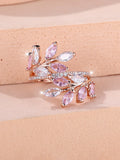 Adjustable horse eye zircon leaf ring in rose gold or platinum plating on a model's hand.