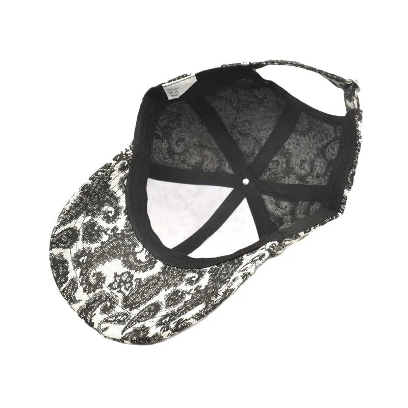 Unisex baseball cap with printed paisley pattern in blue colour option showing dome crown design