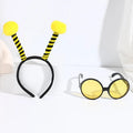 Yellow bee costume headband and matching glasses set on mannequin display