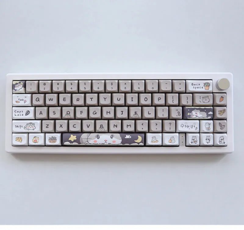 XDA profile mechanical keyboard keycaps in custard colour with mouse grey and yellow designs