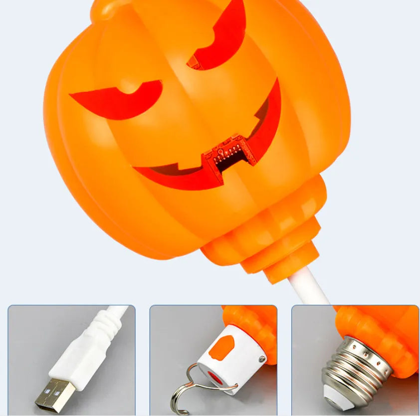 Plastic pumpkin lamp with USB charging cable in purple or yellow light colour