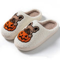 Halloween pumpkin design plush slippers with black velvet upper and TPR rubber sole.