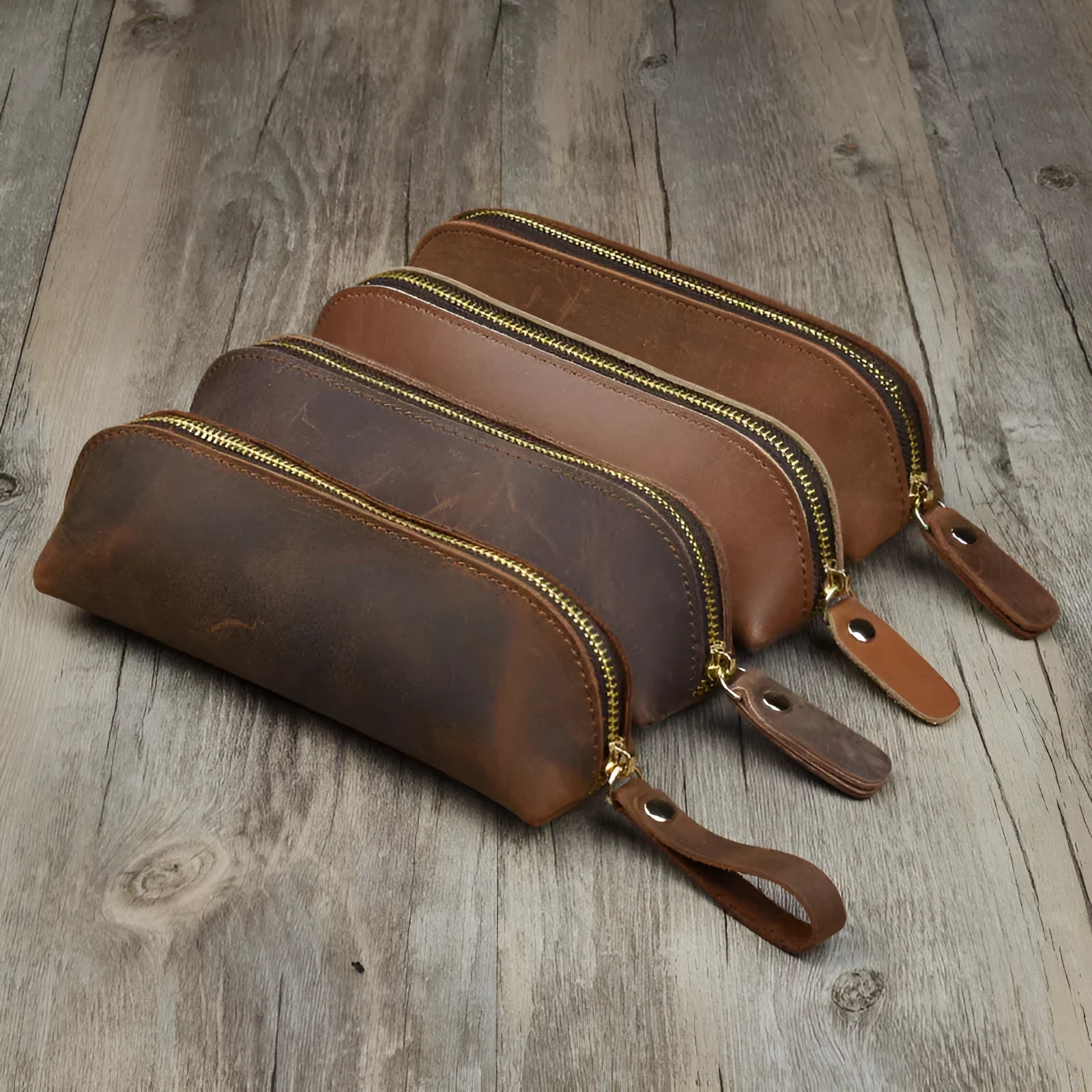 Genuine cowhide leather pencil case with zipper closure in square design measuring 18cm