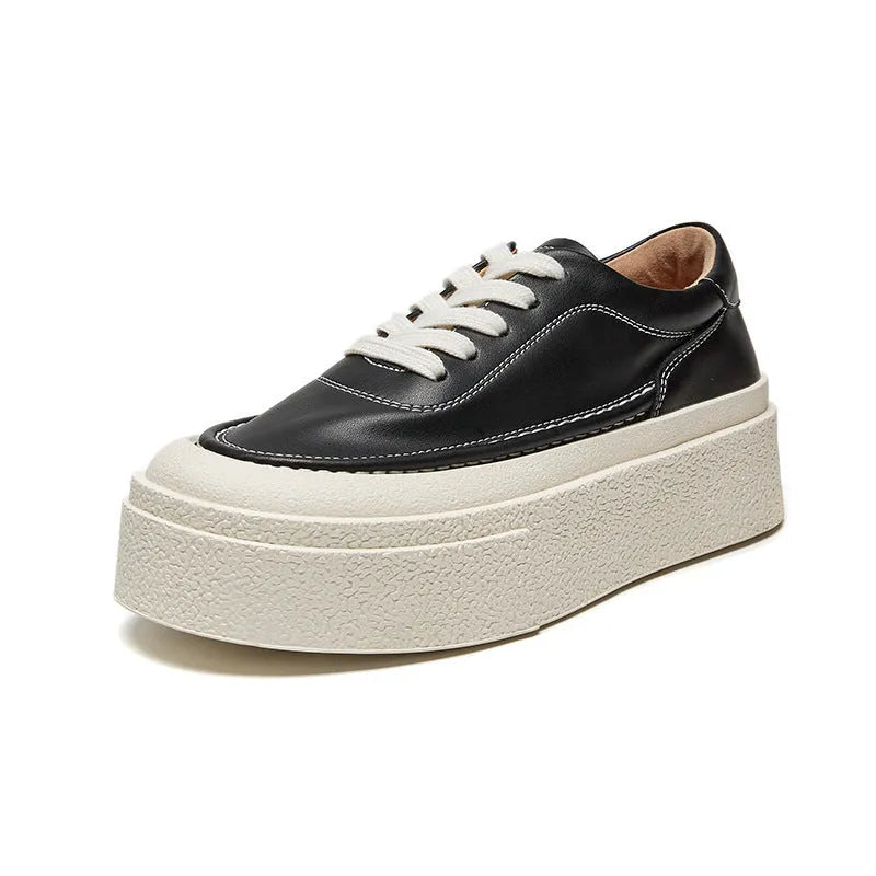 Women's black platform casual sports shoes with embossed cowhide upper and tied lace design
