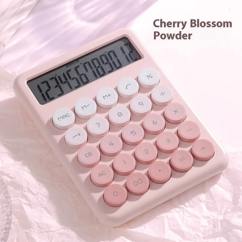 Gradient colour desk calculator showing violet, pink, blue and green colour options