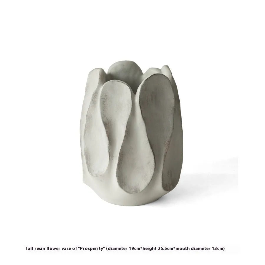Irregular ceramic vase with magnesium clay glazing in high and low style options