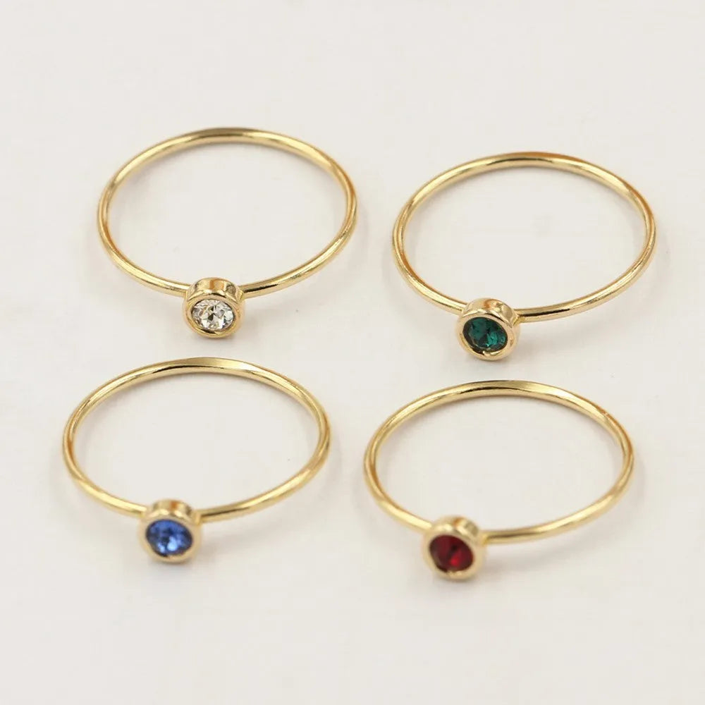 Women's copper knuckle ring with 14K gilded GF zircon DIY ornament accessories in green, blue, dark red, and white colour options.
