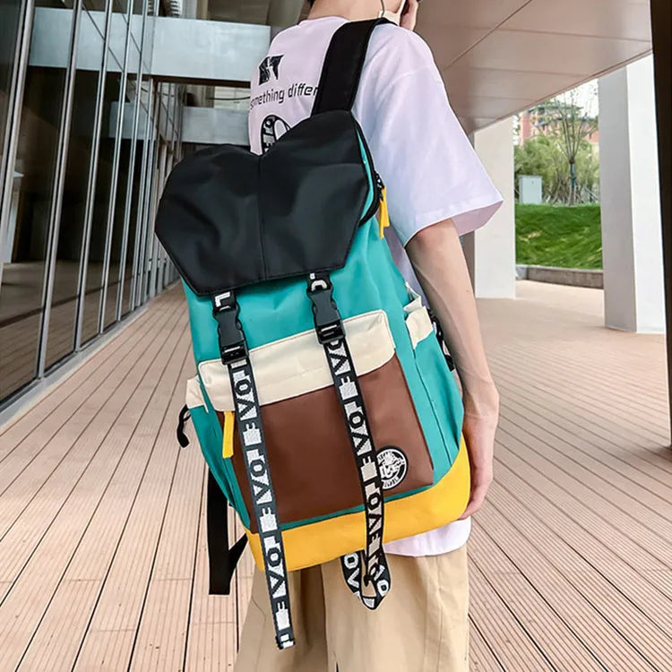 Oxford cloth school backpack in black, green, or red with handheld, shoulder and backpack carrying options