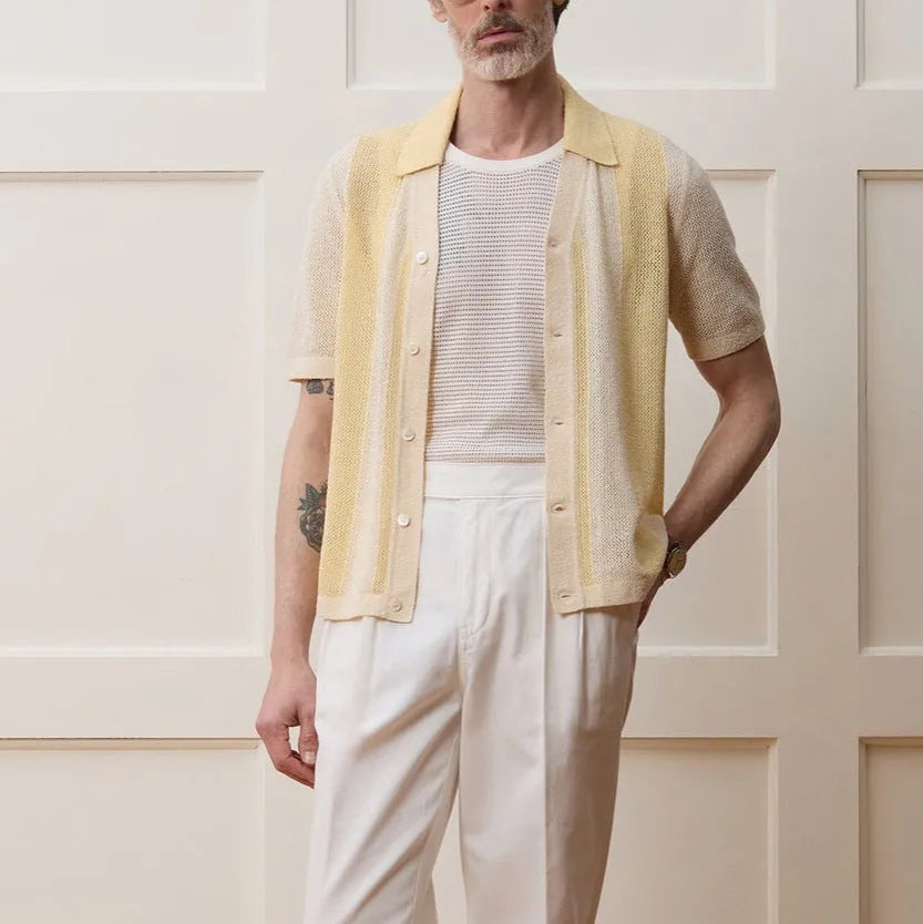 Yellow casual polo shirt with hollow-out design and asymmetric style in Tencel fabric