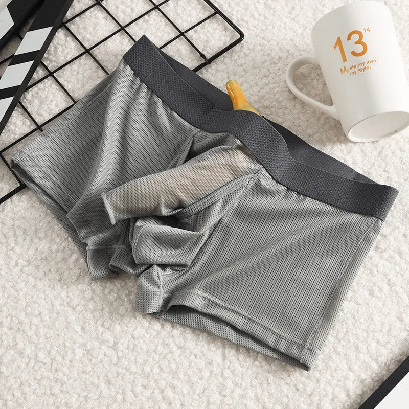 Men's ice silk boxer underwear in black colour showing low waist design and mesh fabric