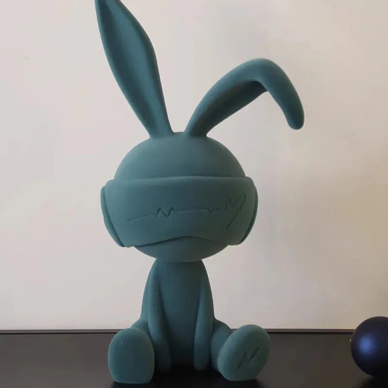Suede blindfold rabbit resin table ornament in green, blue, or red colour options