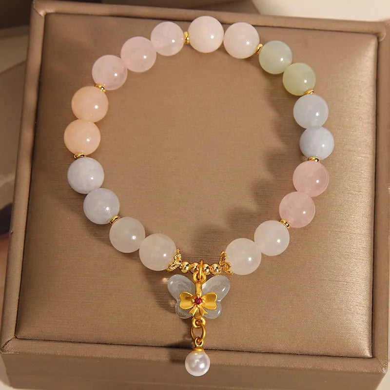 Women's crystal bracelet with a colourful morganite butterfly pendant in an original design.