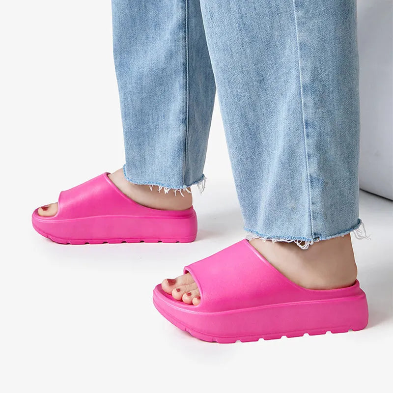 Women's beige fish mouth design EVA foam slippers with a thick 5.5cm sole.