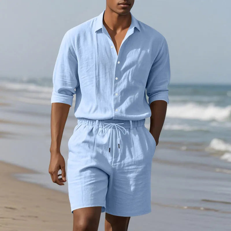 Linen beach suit set showing long sleeve shirt and matching shorts in light blue colour