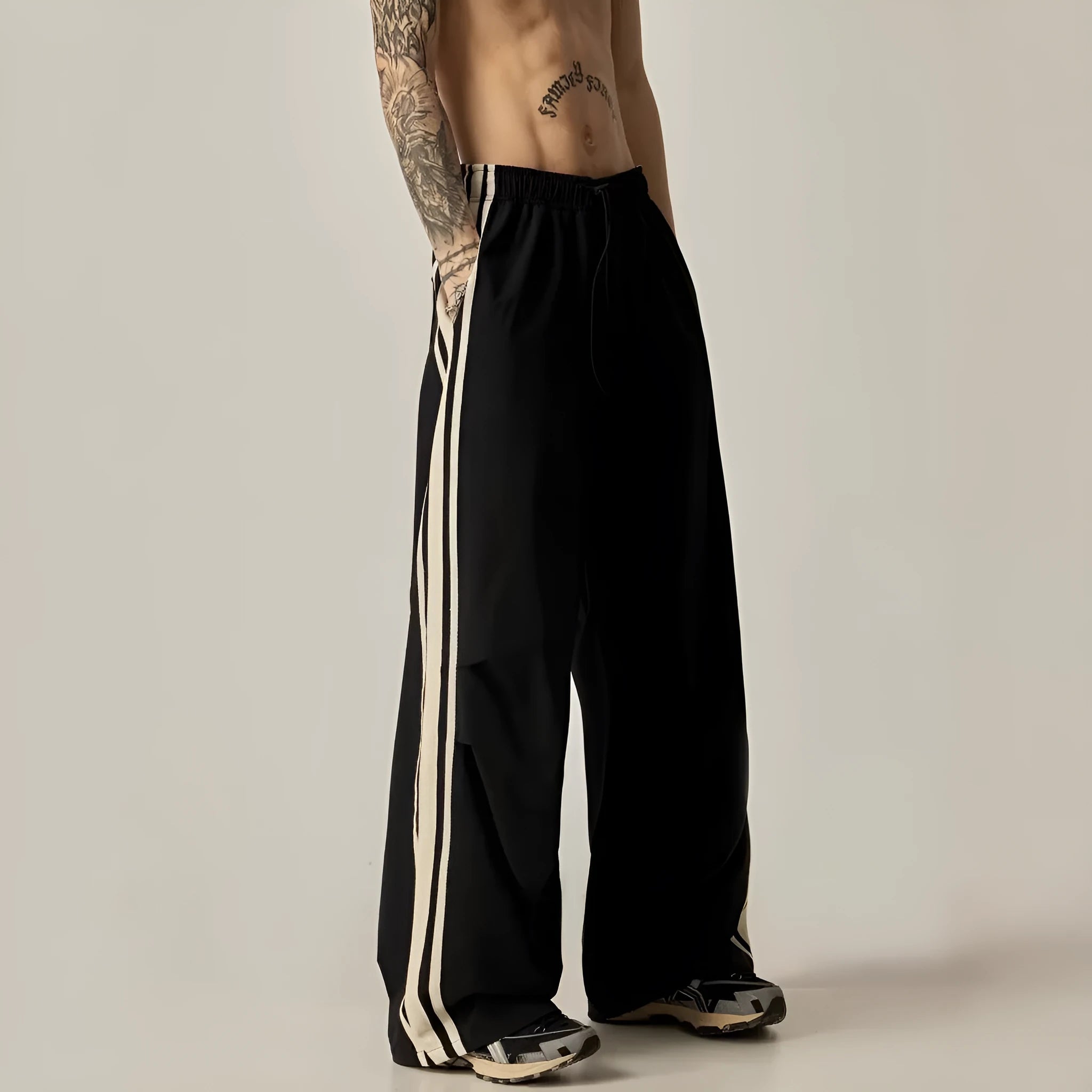 Black men's wide leg climbing pants with high waist and long straight-leg style made of polyester