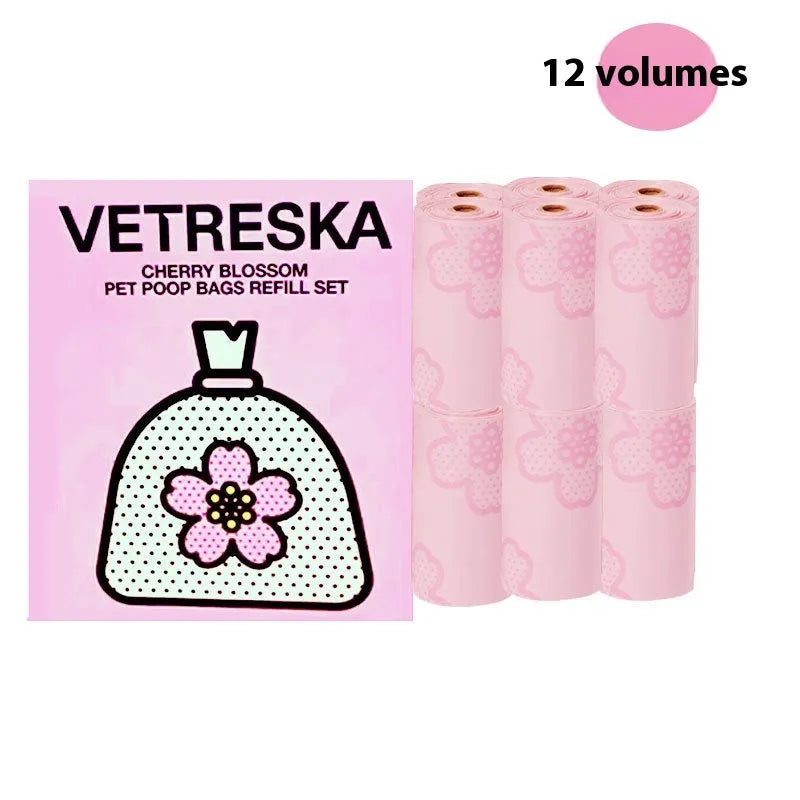 Dog waste disposal capsule with biodegradable bags in strawberry, orange, and cherry blossom colour options