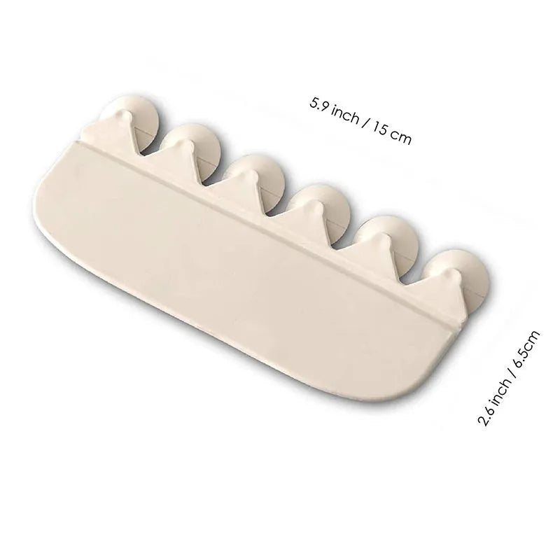 White PVC urine blocking board for children's toilet training placed around toilet bowl
