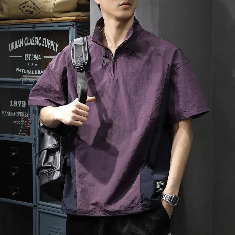 Men's brown half-zip short sleeve casual shirt with a stand collar, shown in a loose fit.