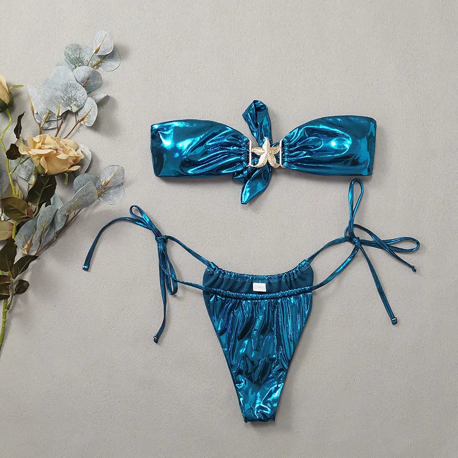 Glossy sapphire blue tube top bikini set with gold starfish print on a mannequin.