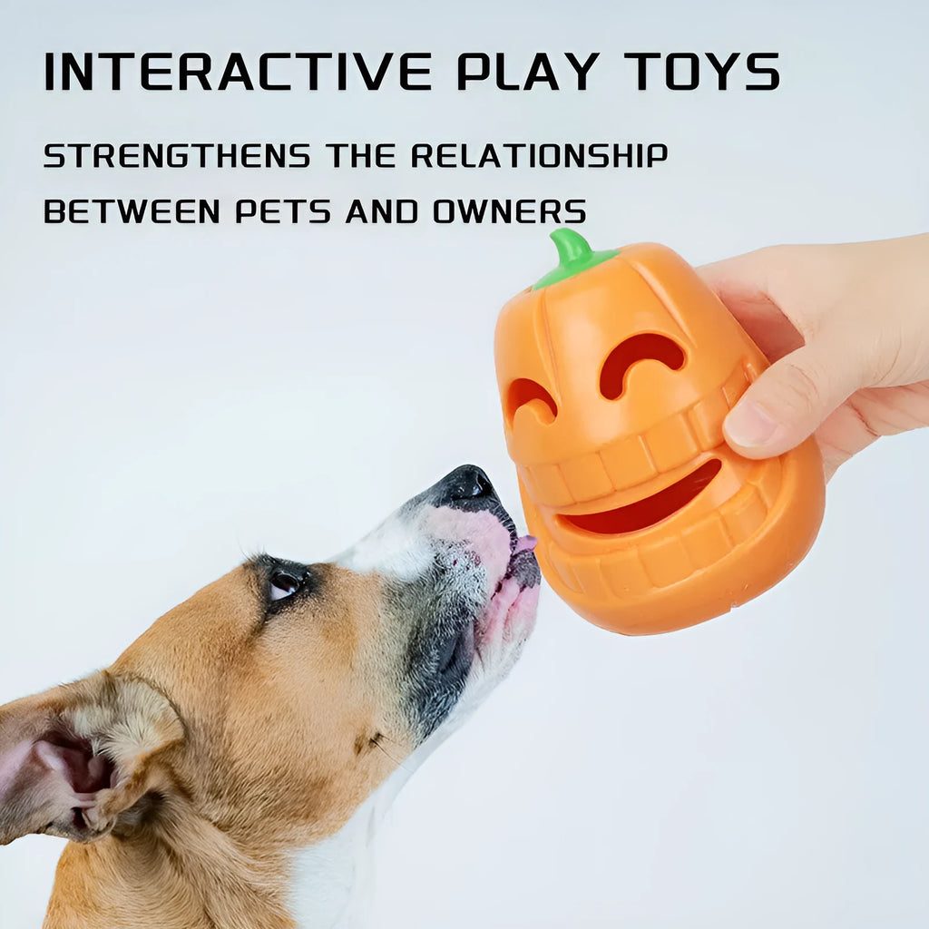 Orange Halloween pumpkin shaped interactive dog chew toy made of thermoplastic rubber with treat dispensing funnel design for all breed sizes