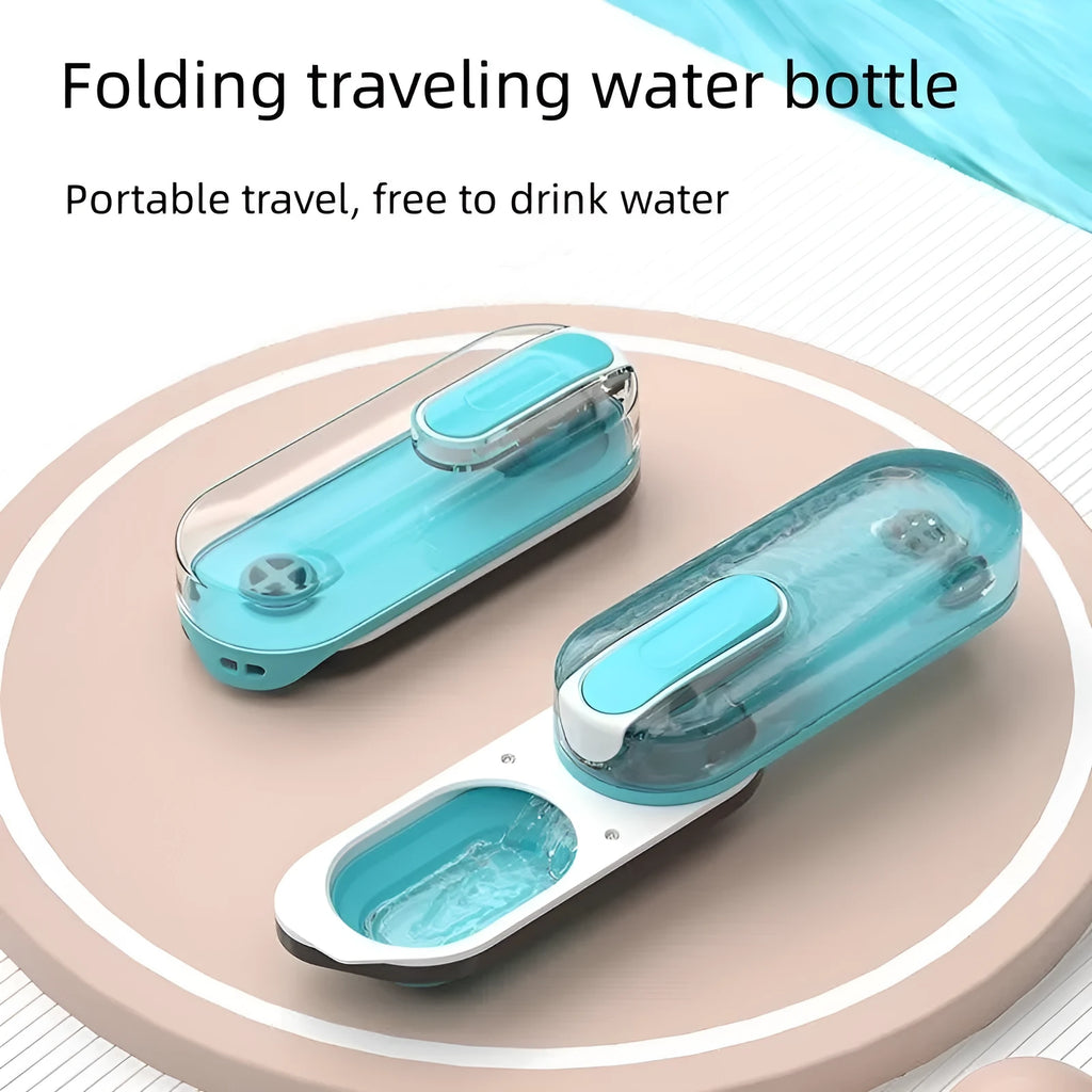 Portable blue pet water bottle with foldable silicone drinking bowl and carabiner clip for dogs and cats