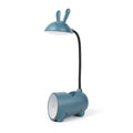 Cartoon-style USB desk lamp with pen storage compartment in green, blue, or pink colour options