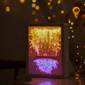 Three-dimensional paper carving USB bedside night light with remote control on wooden table