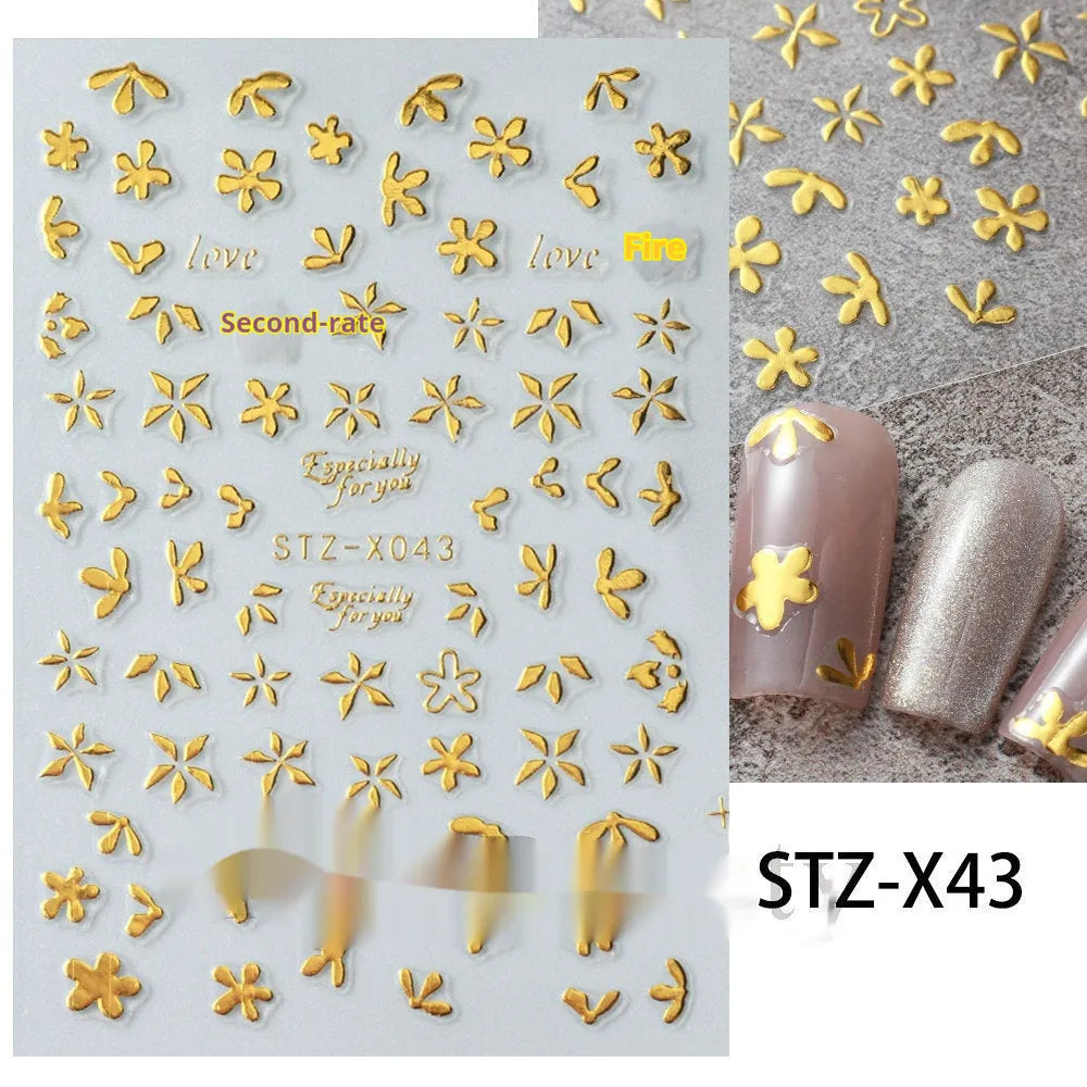 Cartoon love pattern nail art sticker decals in black and silver colours on a plastic sheet.