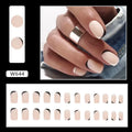 Black and white frosted French manicure artificial nails on display
