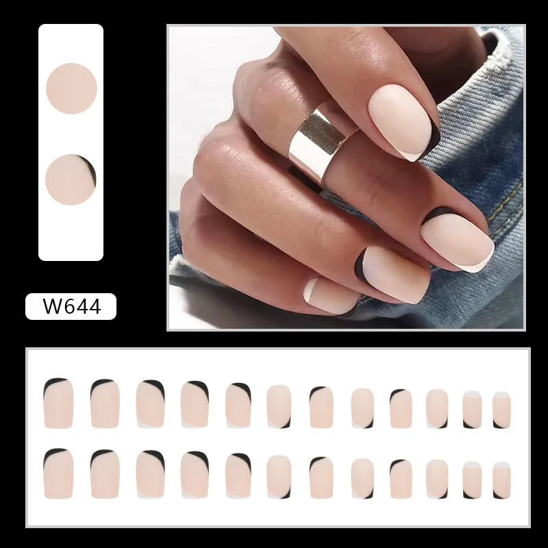 Black and white frosted French manicure artificial nails on display