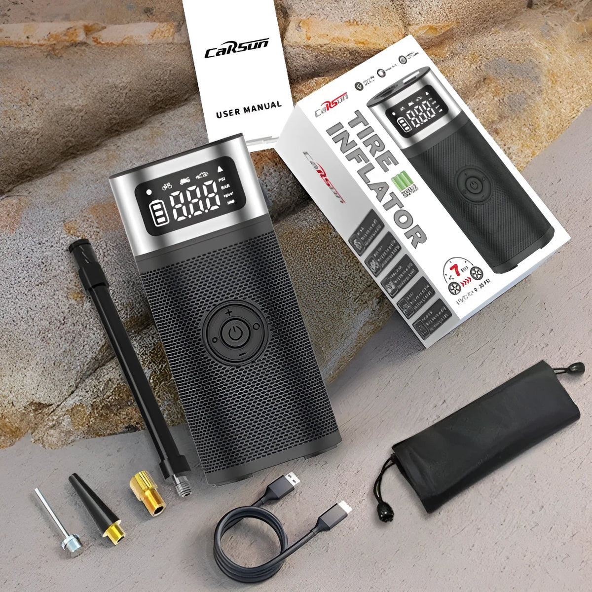 Black portable wireless vehicle air pump with USB charging cable, 15cm tube, and nozzles for bicycle, ball, and swimming ring.