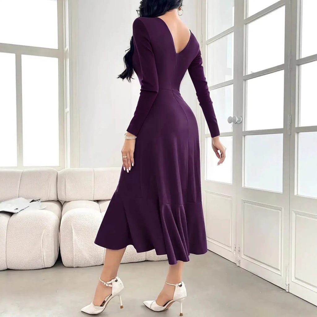 Purple women's long sleeve dress with ruffles, round neck, and mid waist.