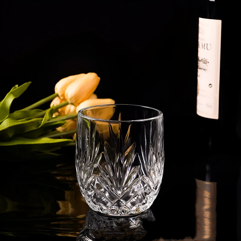 Whiskey shot glass with thick bottom in crystal glass showing colour variations and capacity scale