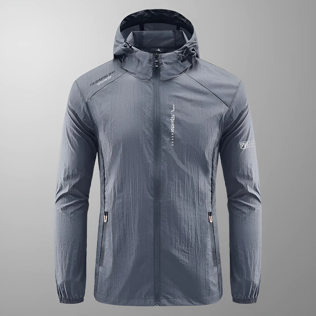 Men's light grey hooded summer jacket showing loose fit and nylon fabric texture