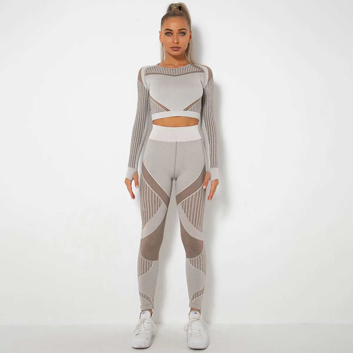 Ethkafi women's seamless long-sleeved yoga wearsuit in a striped pattern.