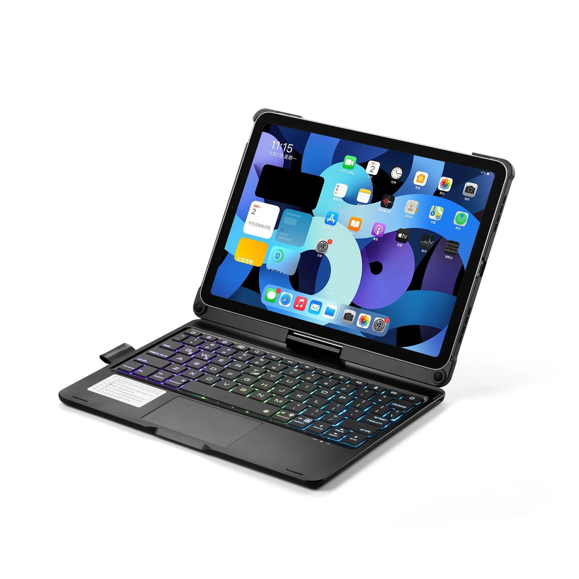 Silver rotating Bluetooth keyboard with backlit keys next to an iPad.