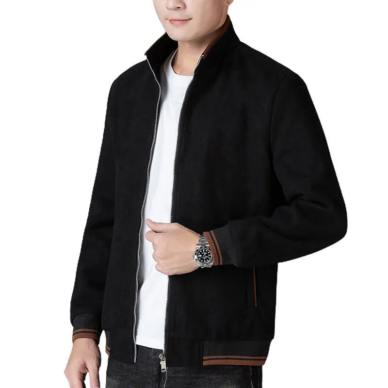 Men's grey polyester fleece sports jacket with long sleeves and a stick pocket.