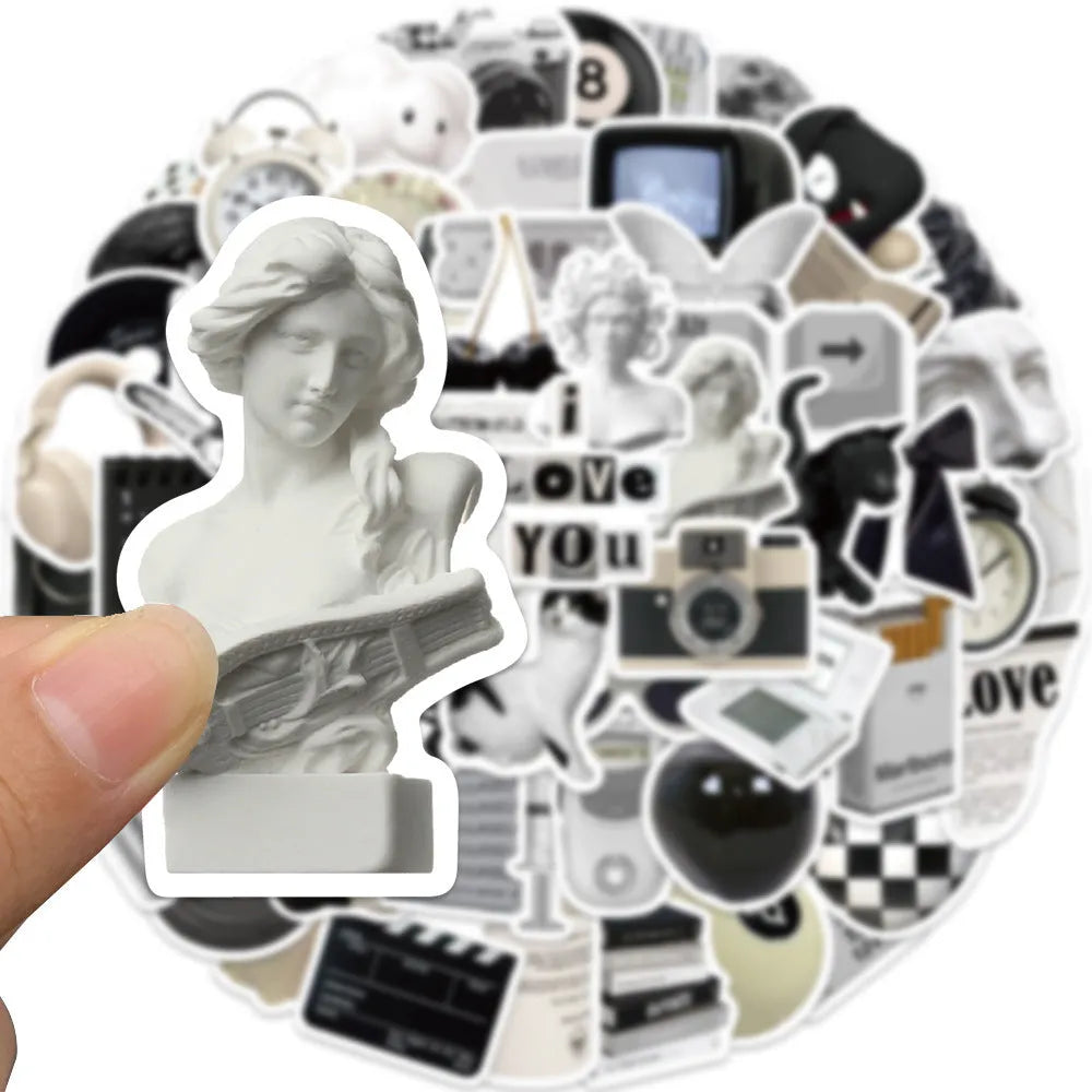 61-piece pack of black and white PVC waterproof decorative stickers for laptops and bottles.