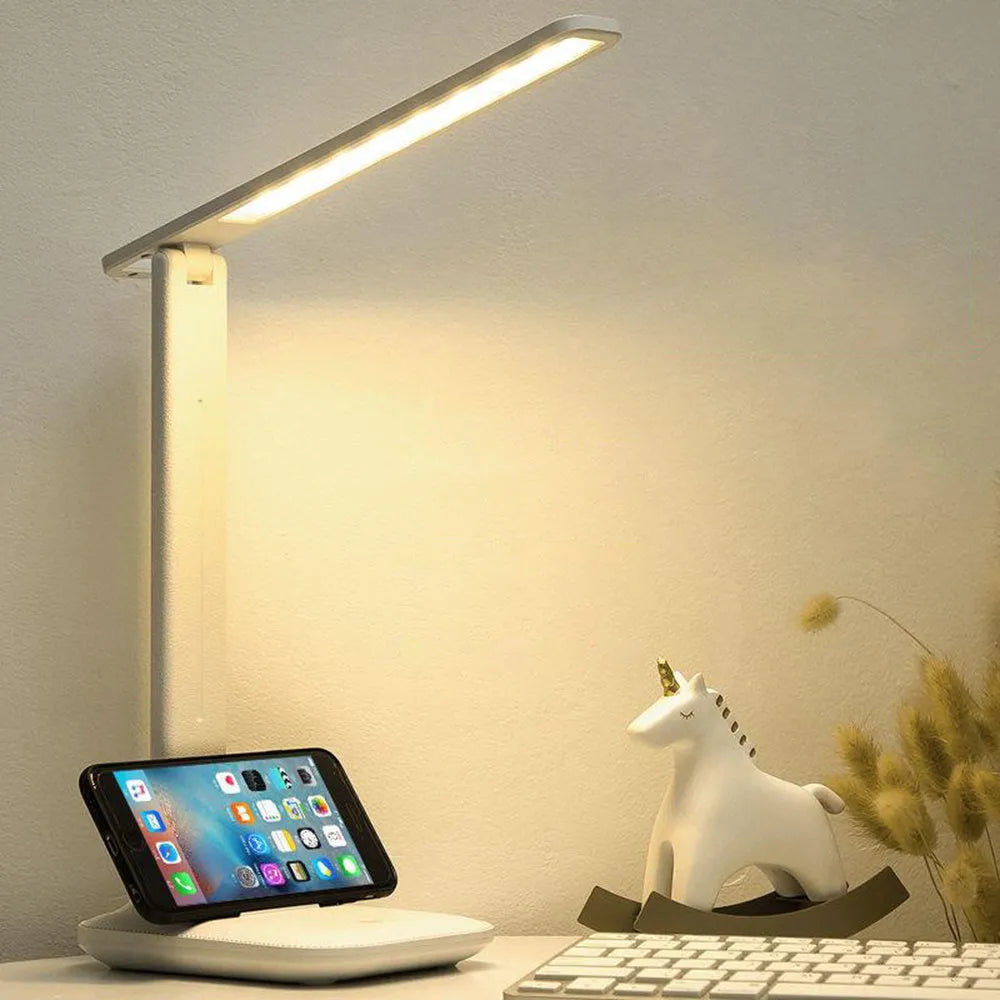 White plastic touch dimming bedside table lamp with USB charging port.