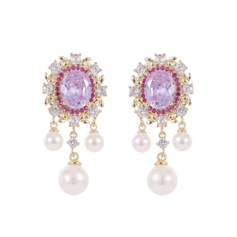 Oval geometric earrings with zircon inlay and tassel detailing in light purple, pink, and white colour options