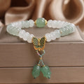 Green crystal abacus bead bracelet with butterfly tassel and pearl rhinestone decoration