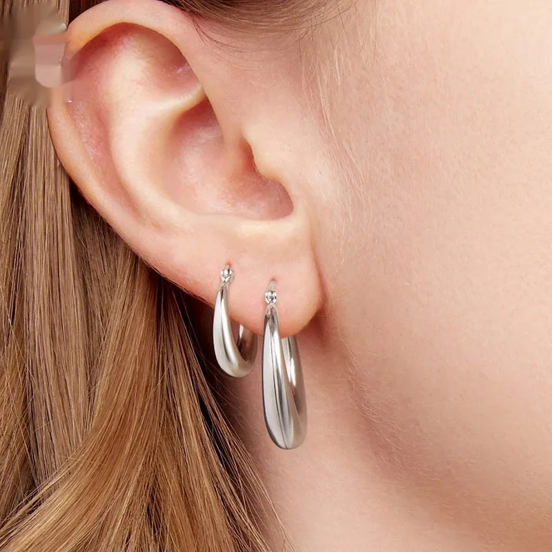 Geometric ring clip earrings with silver needle detail in electroplated copper