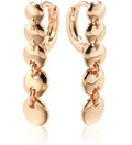 Long gold retro circle earrings with woven chain design, shown from the side.
