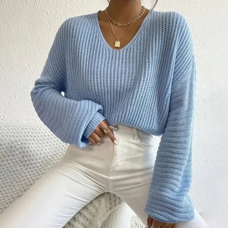 Women's solid color long sleeve pullover top in loose casual fit made of polyester