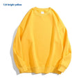 A loose-fitting, light blue off shoulder sweater with long sleeves and a round neck, made from cotton.