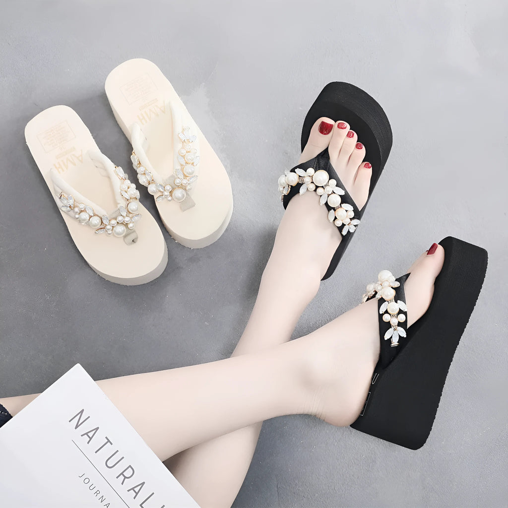 Women's black wedge-heel flip-flops with cotton cloth upper and toe strap