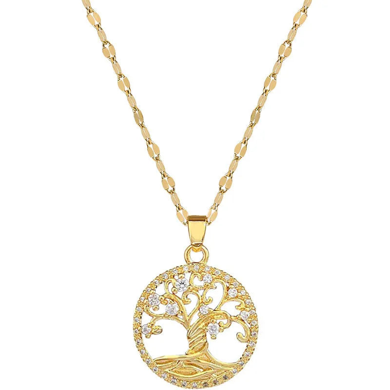 Gold plated stainless steel necklace with mother of pearl lucky tree pendant and cross elements on a lip chain