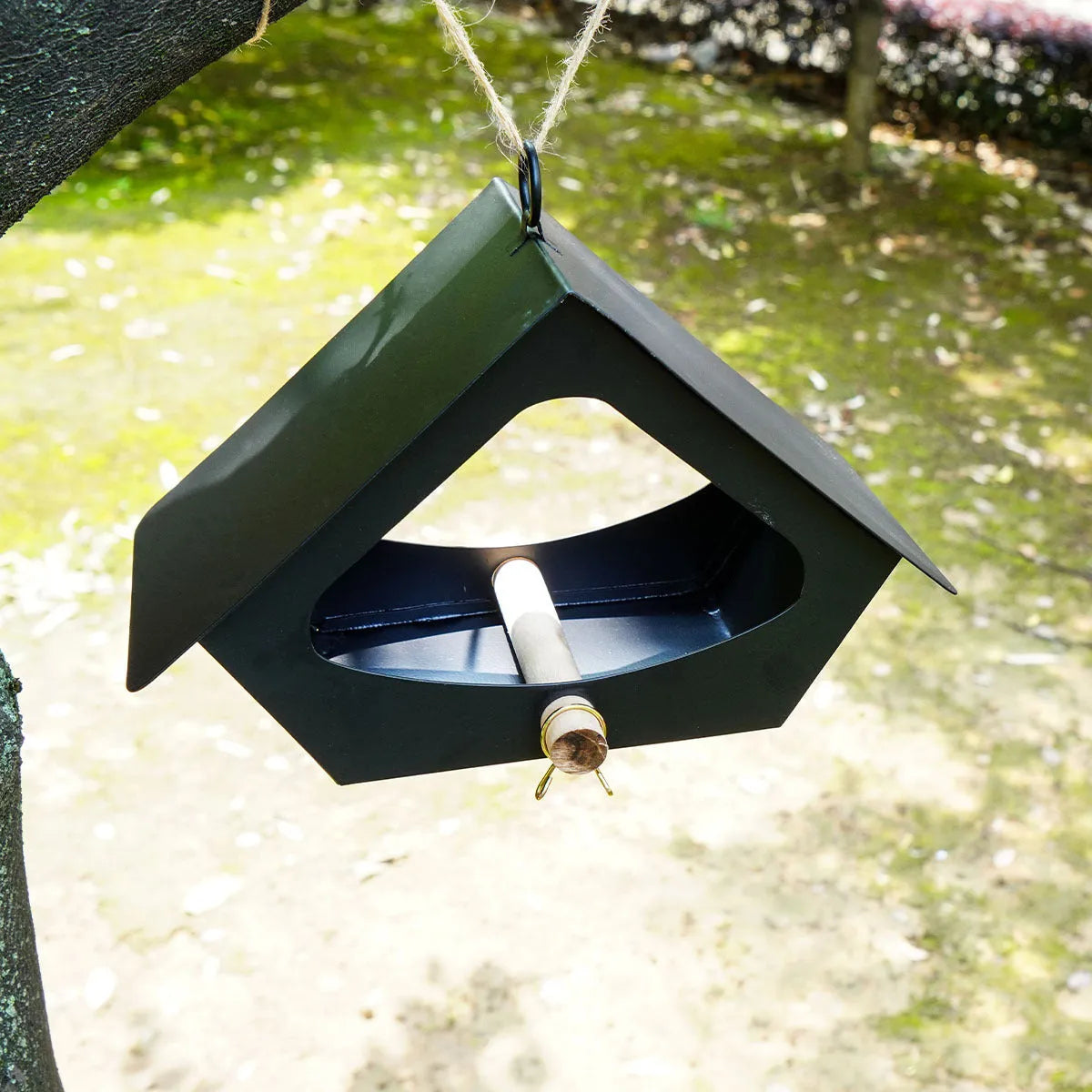 Simple modern iron bird nest feeder for outdoor garden decoration.