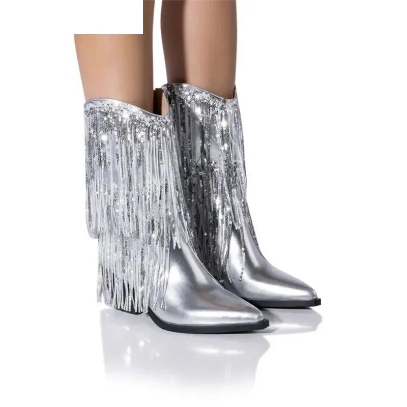 Women's black chunky heel tassel boots with pointed toe and high stiletto heel on a white background.