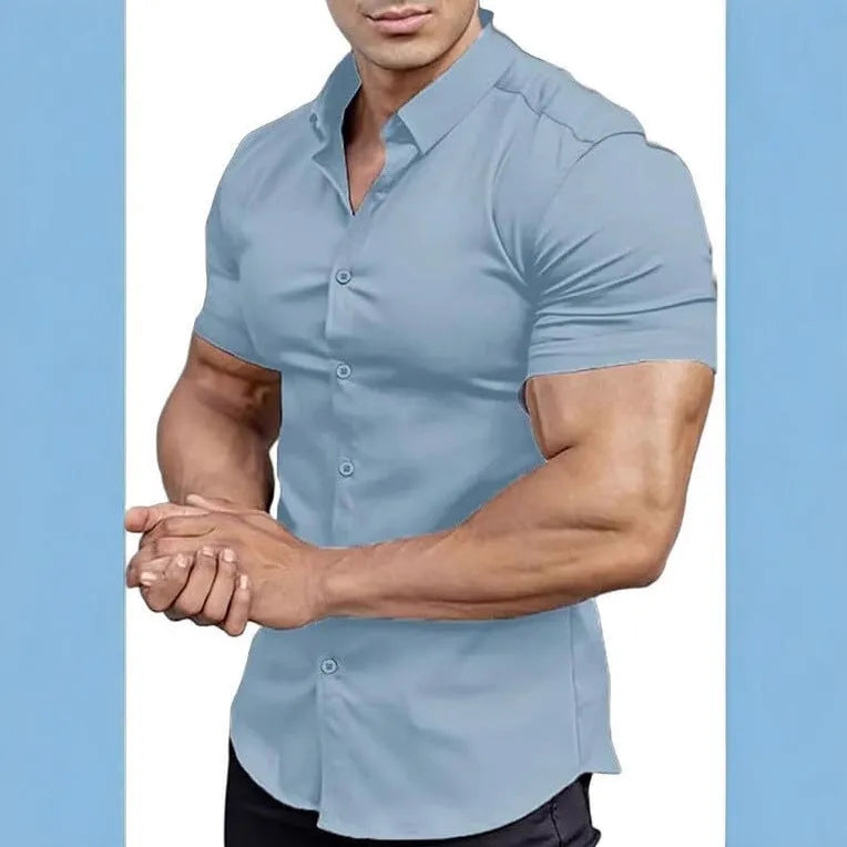 Man wearing a brown short sleeve printed casual shirt with a shirt collar.